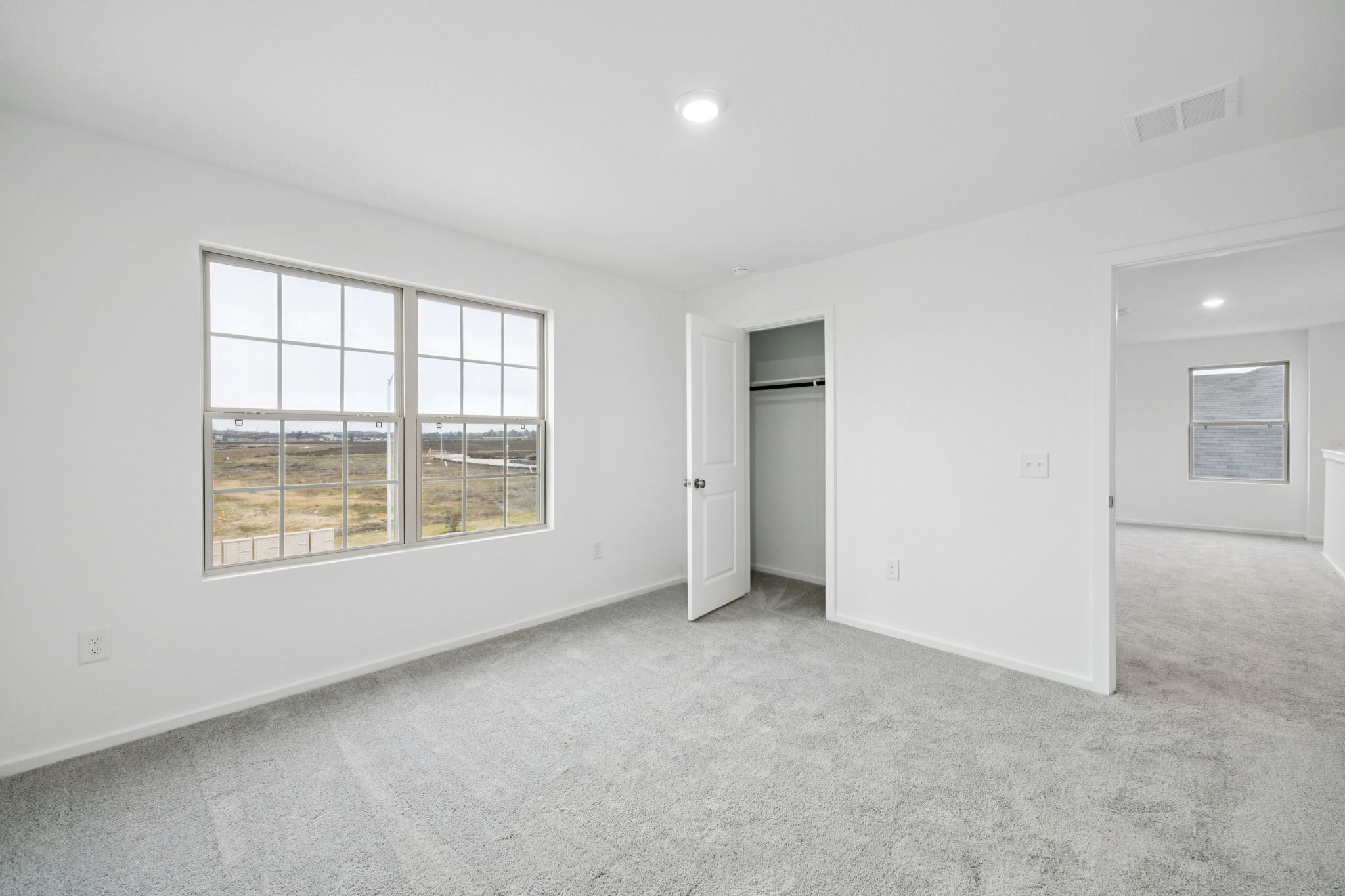 414 Point Nemo Street Crosby, TX 77532 - Photo 22 of 50 an empty room with a window
