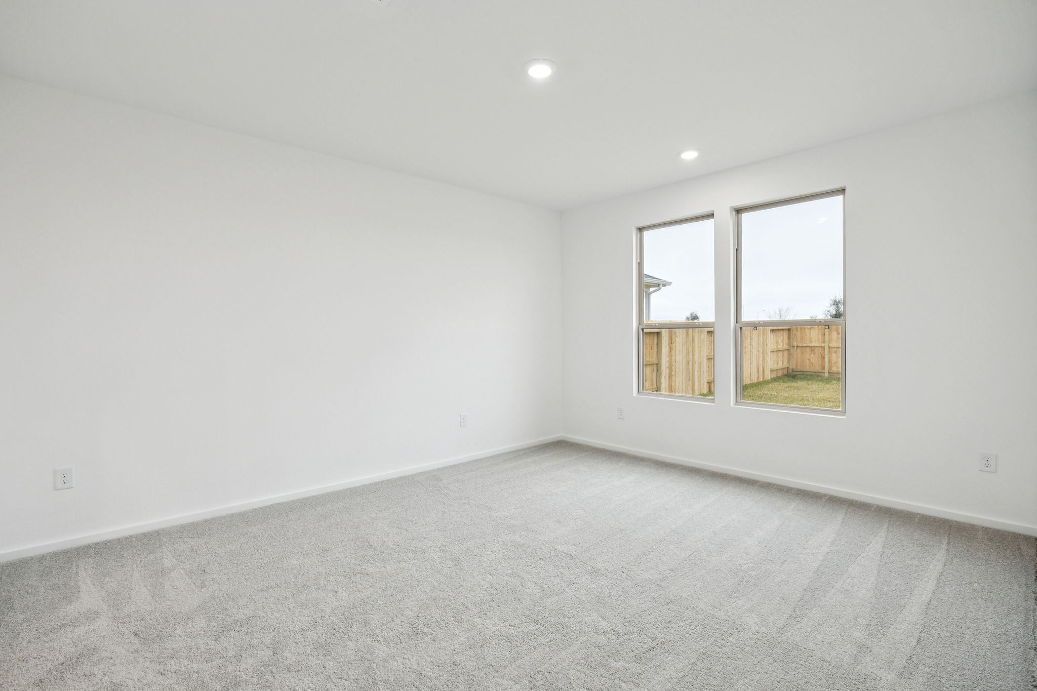 414 Point Nemo Street Crosby, TX 77532 - Photo 9 of 50 an empty room with a window