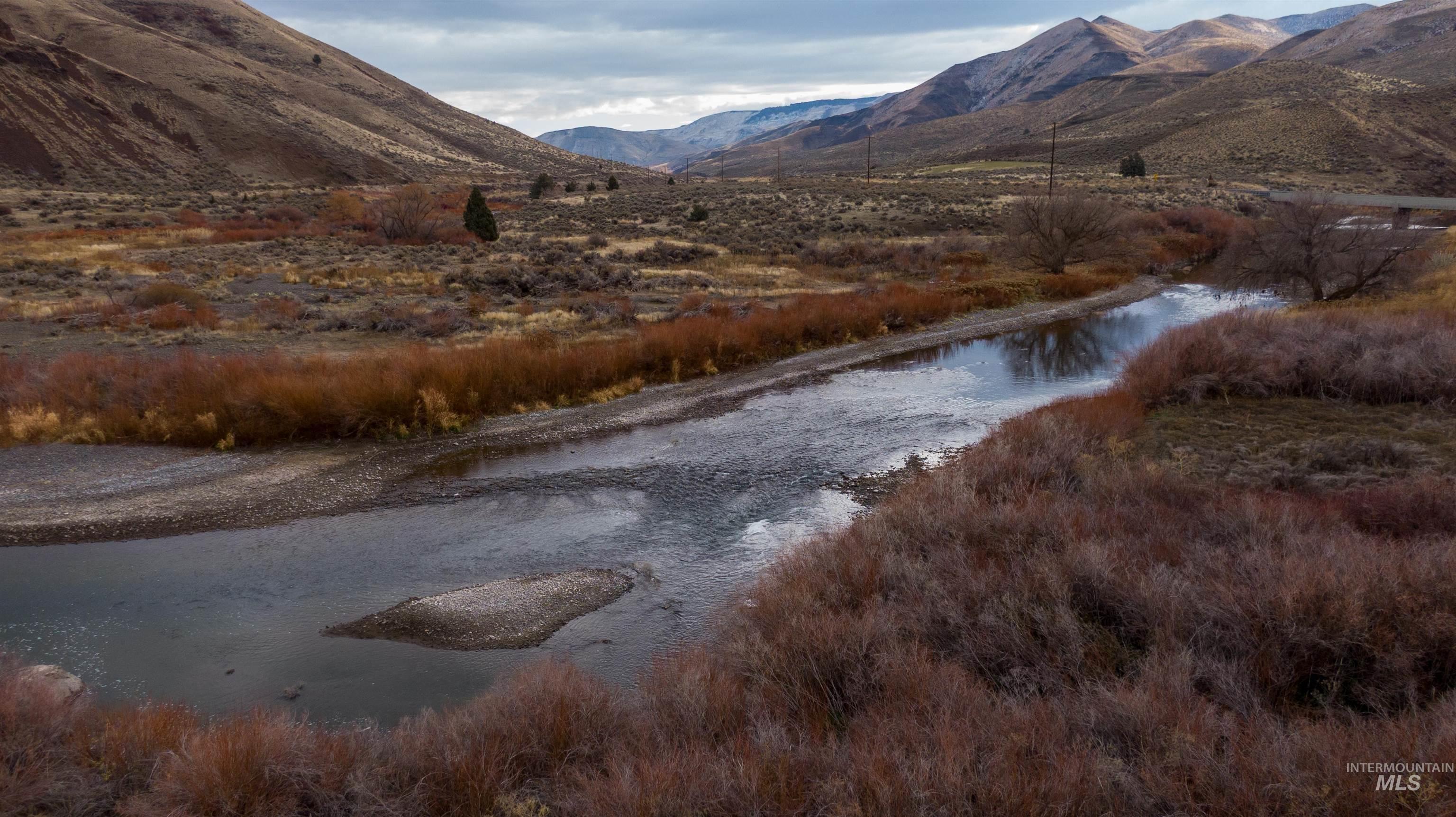 Tbd Juntura, OR 97911 - Photo 8 of 27 Mountain view with a large body of water
