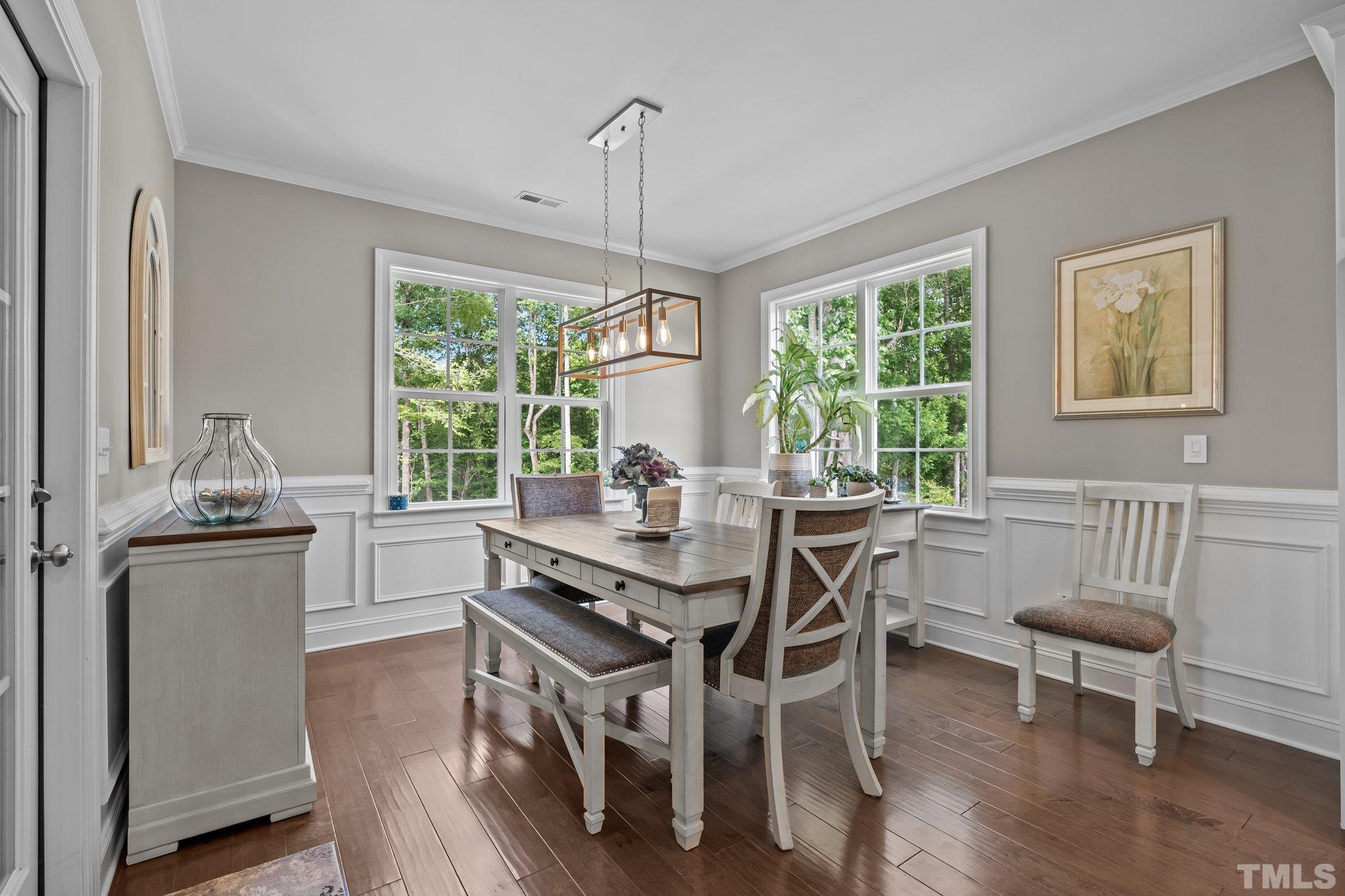 391 River Ridge Lane Timberlake, NC 27583 - Photo 20 of 47 a view of a dining room with furniture window and outside view