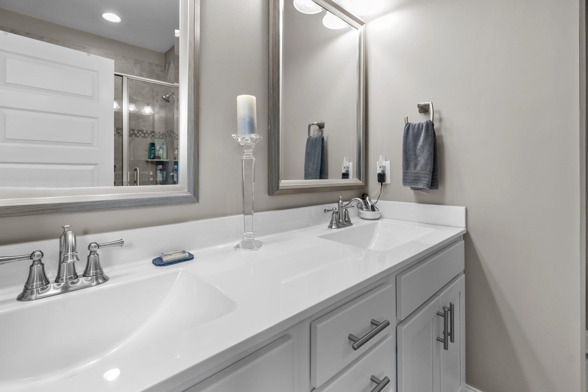 391 River Ridge Lane Timberlake, NC 27583 - Photo 24 of 47 a bathroom with a sink and a mirror