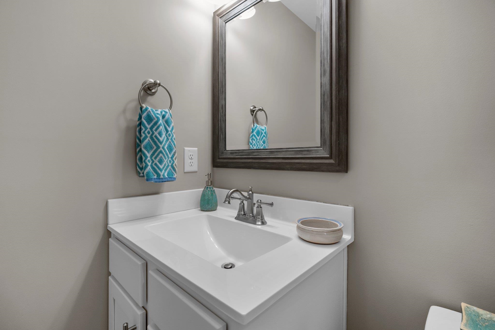 391 River Ridge Lane Timberlake, NC 27583 - Photo 31 of 47 a bathroom with a sink and a mirror