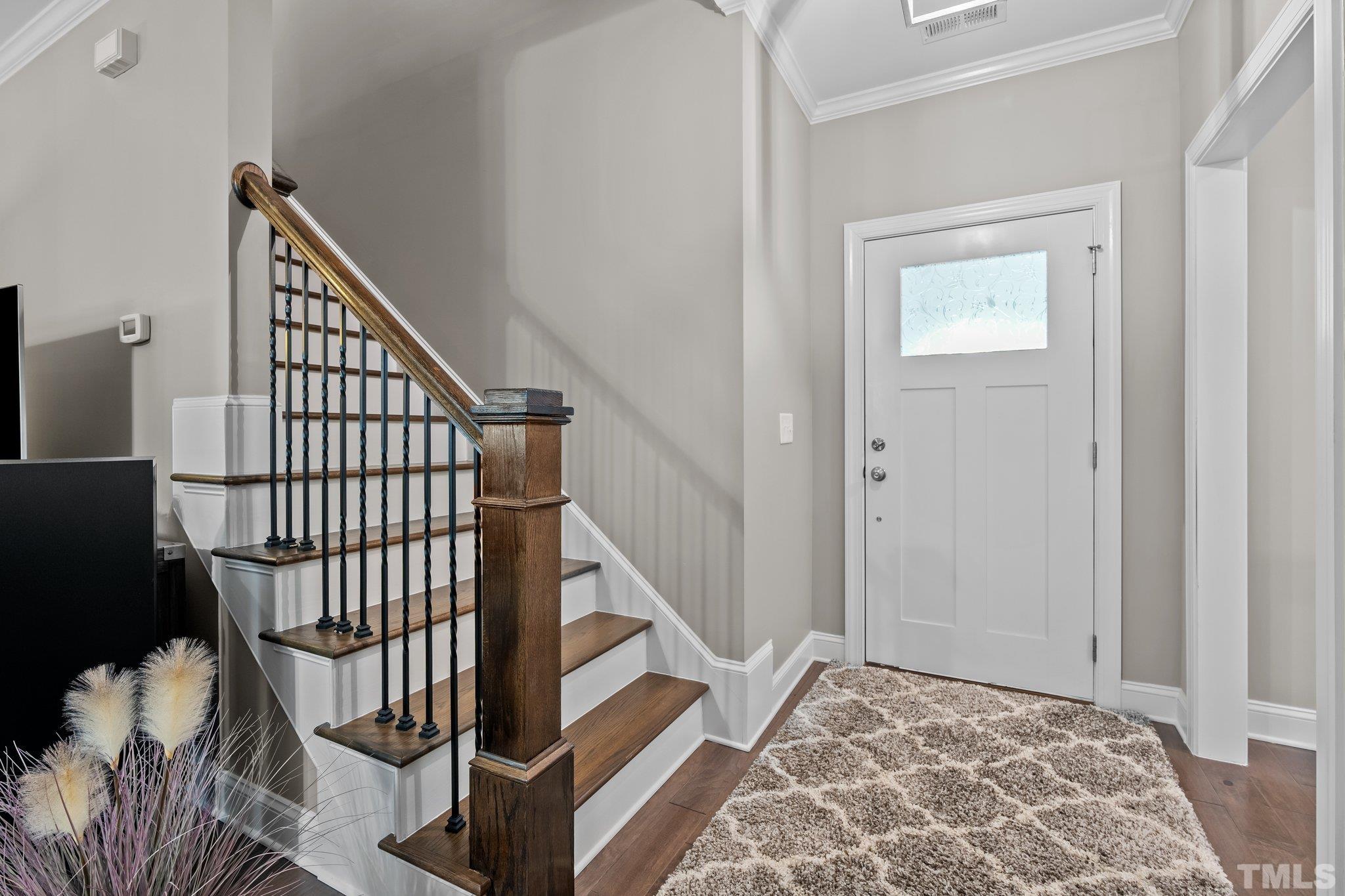 391 River Ridge Lane Timberlake, NC 27583 - Photo 8 of 47 a view of an entryway with wooden floor