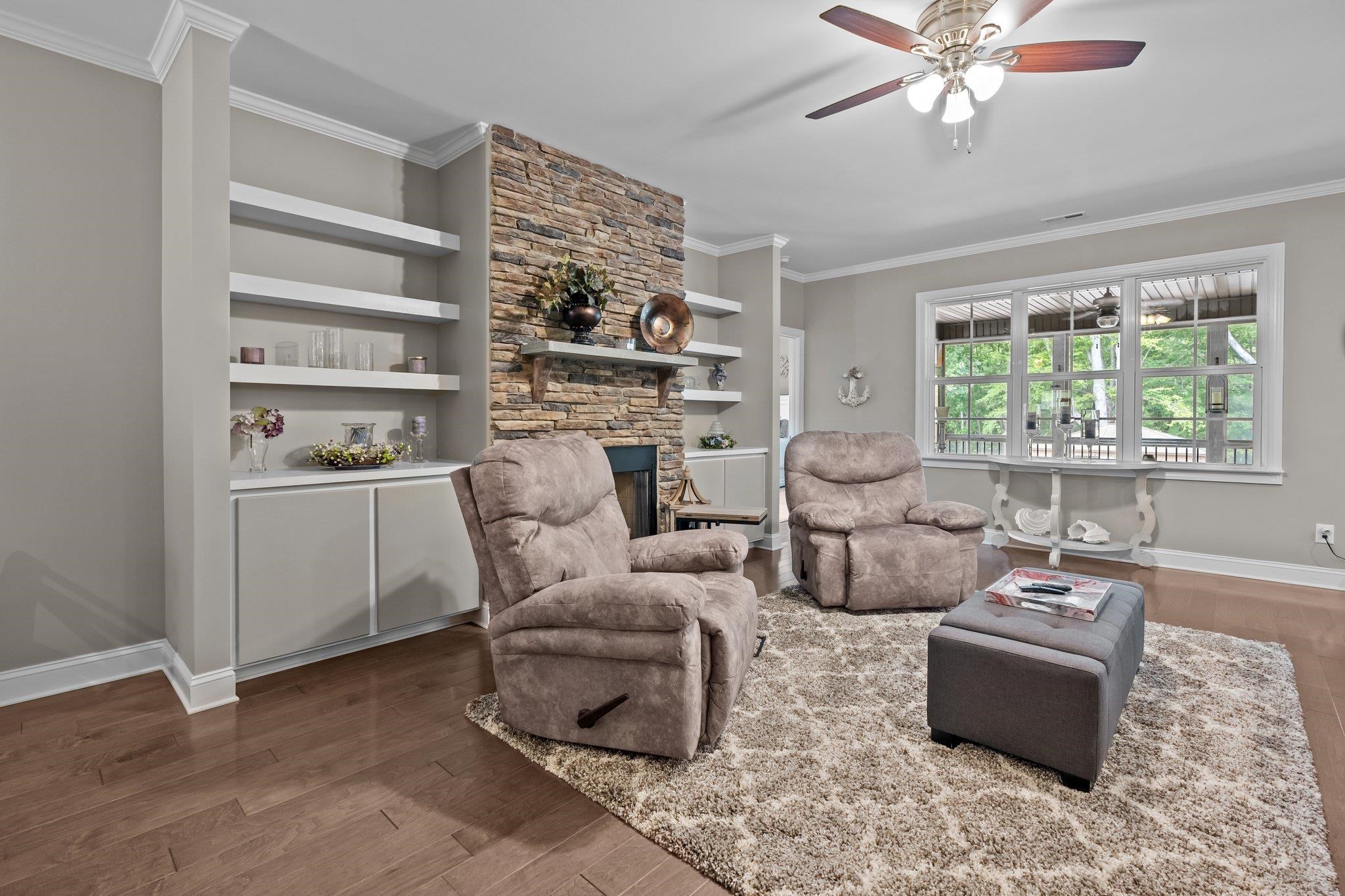 391 River Ridge Lane Timberlake, NC 27583 - Photo 10 of 47 a living room with furniture and a window