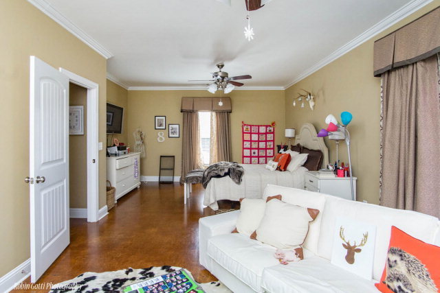 7665 Whittle Road Macon, GA 31220 - Photo 22 of 42 a living room with furniture and a wooden floor