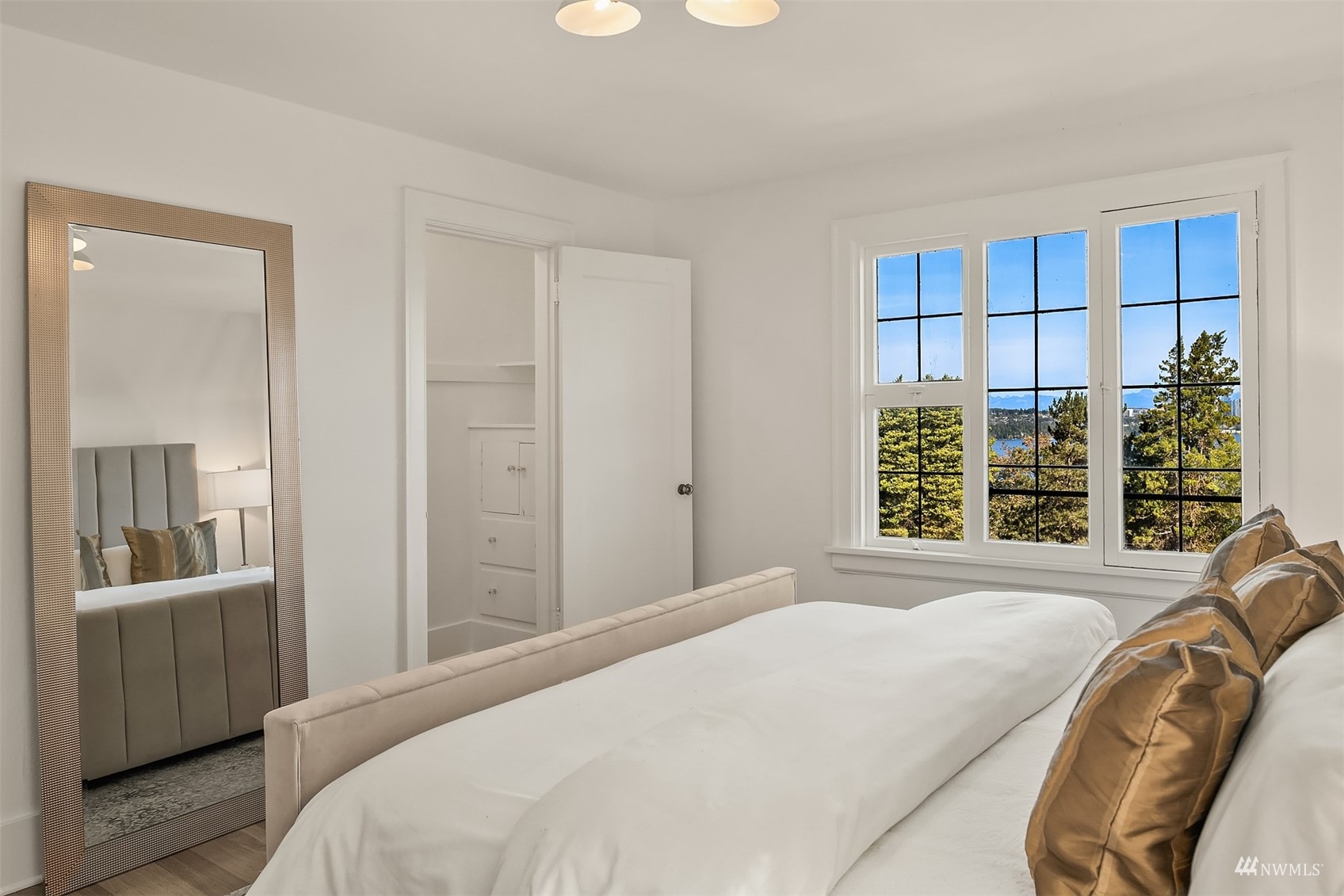 732 36th Avenue Seattle, WA 98122 - Photo 17 of 37 a bedroom with a bed and a window