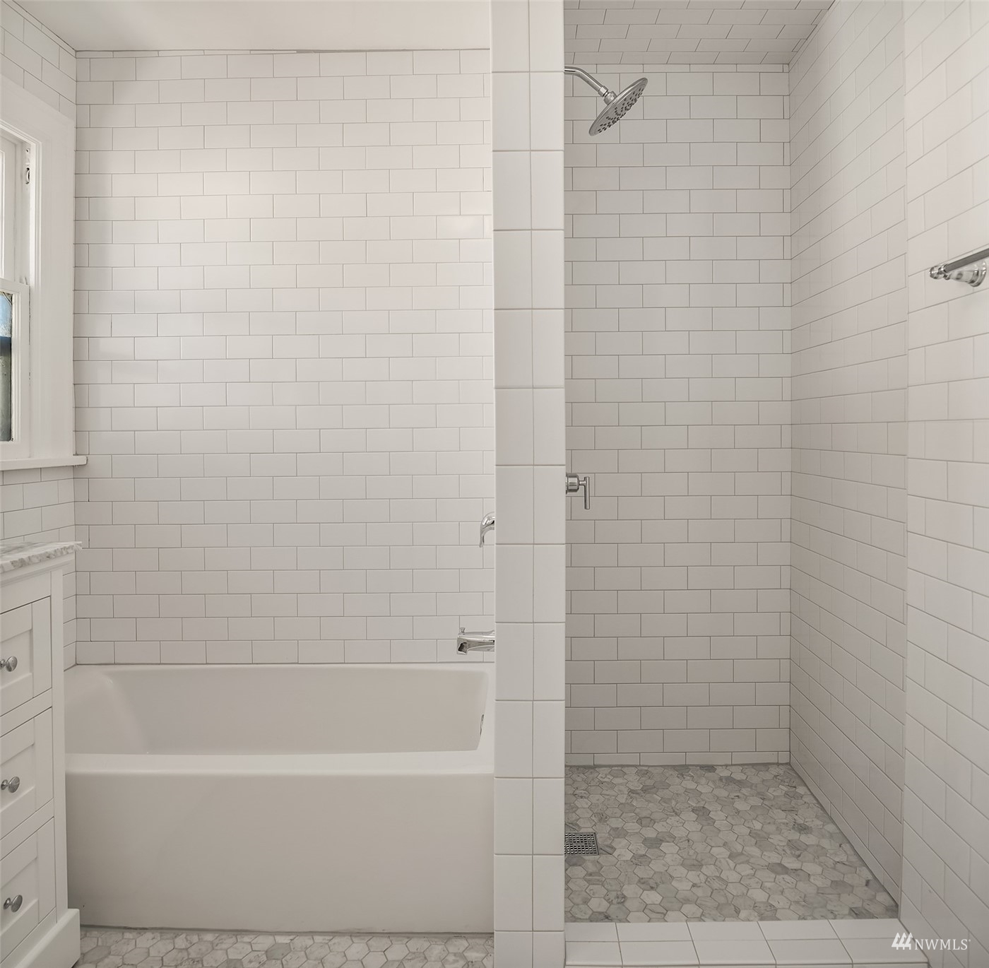 732 36th Avenue Seattle, WA 98122 - Photo 19 of 37 a bathroom with a shower and a bathtub