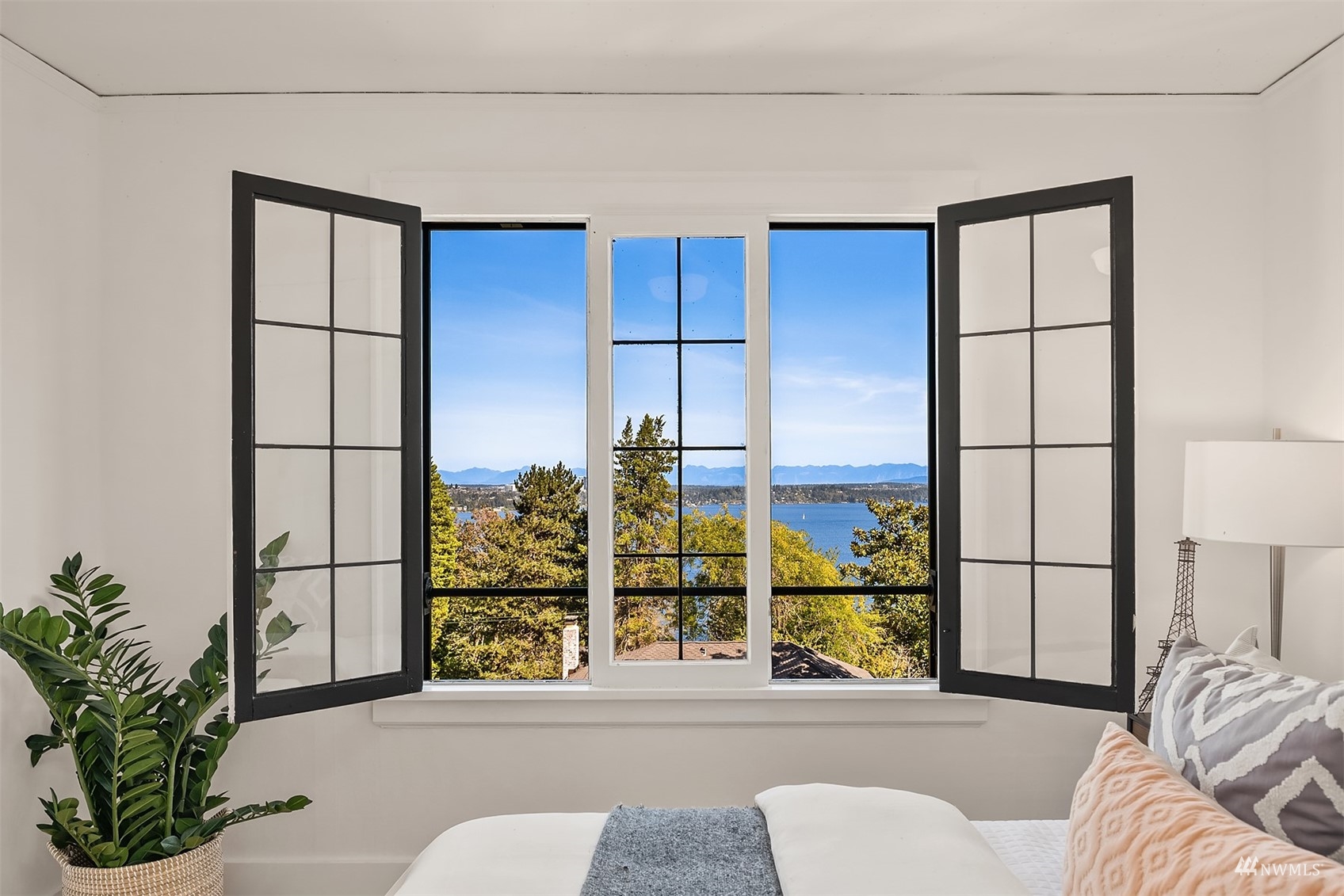732 36th Avenue Seattle, WA 98122 - Photo 21 of 37 a living room with a large window and furniture