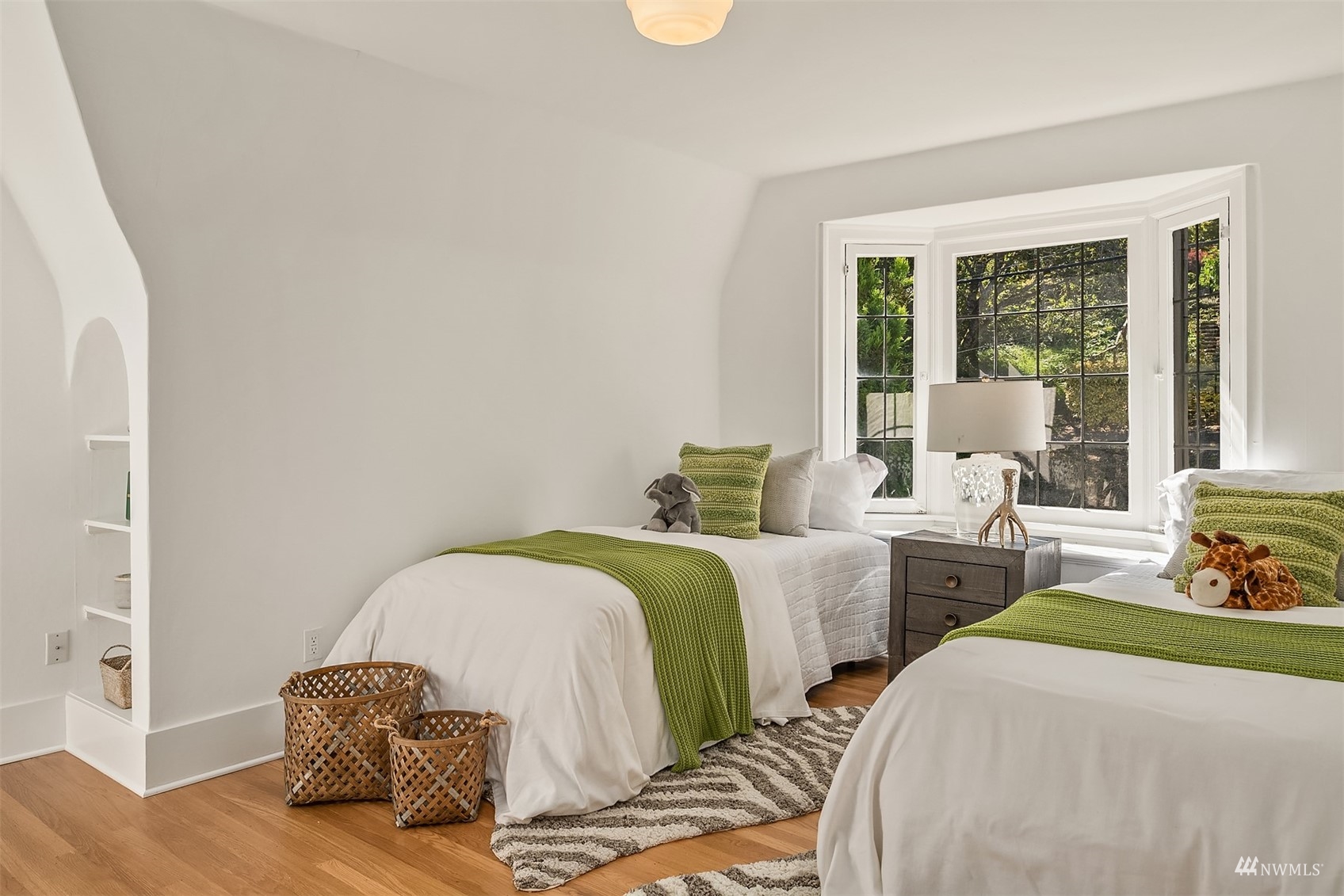 732 36th Avenue Seattle, WA 98122 - Photo 22 of 37 a bedroom with two beds and a large window