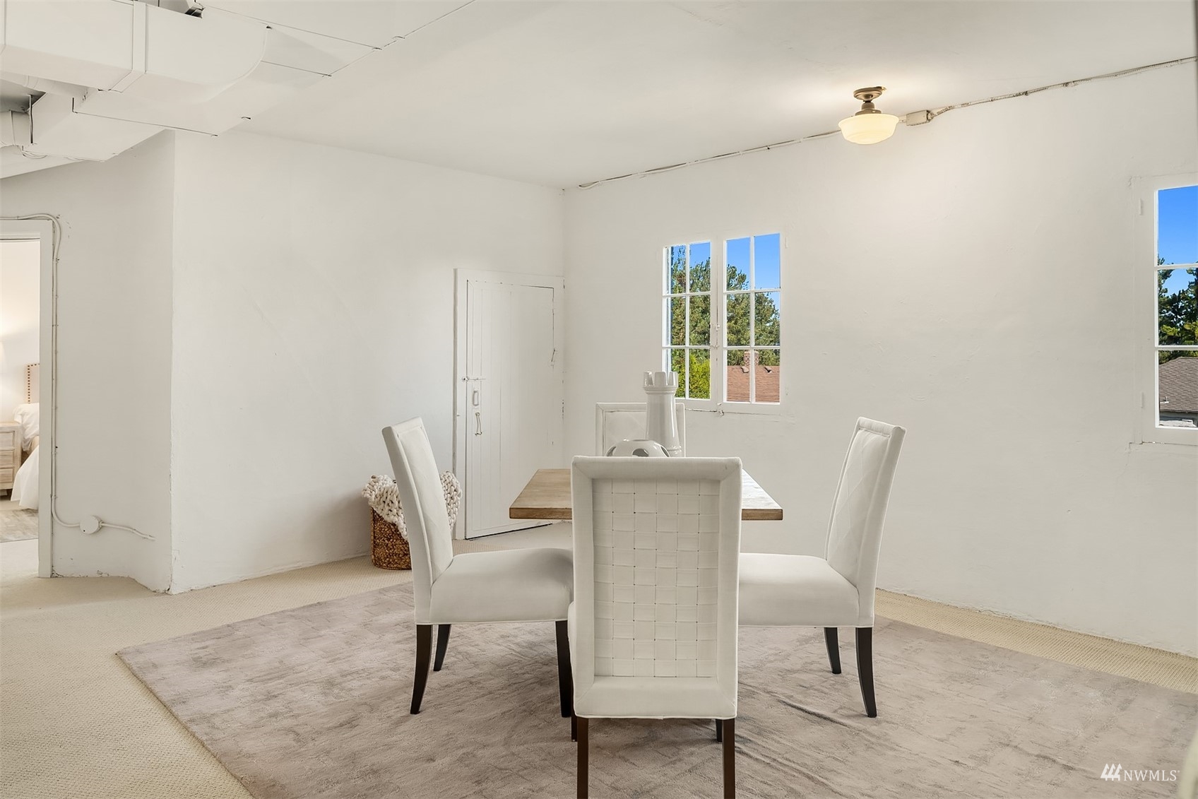 732 36th Avenue Seattle, WA 98122 - Photo 26 of 37 a view of a dining room with furniture and wooden floor