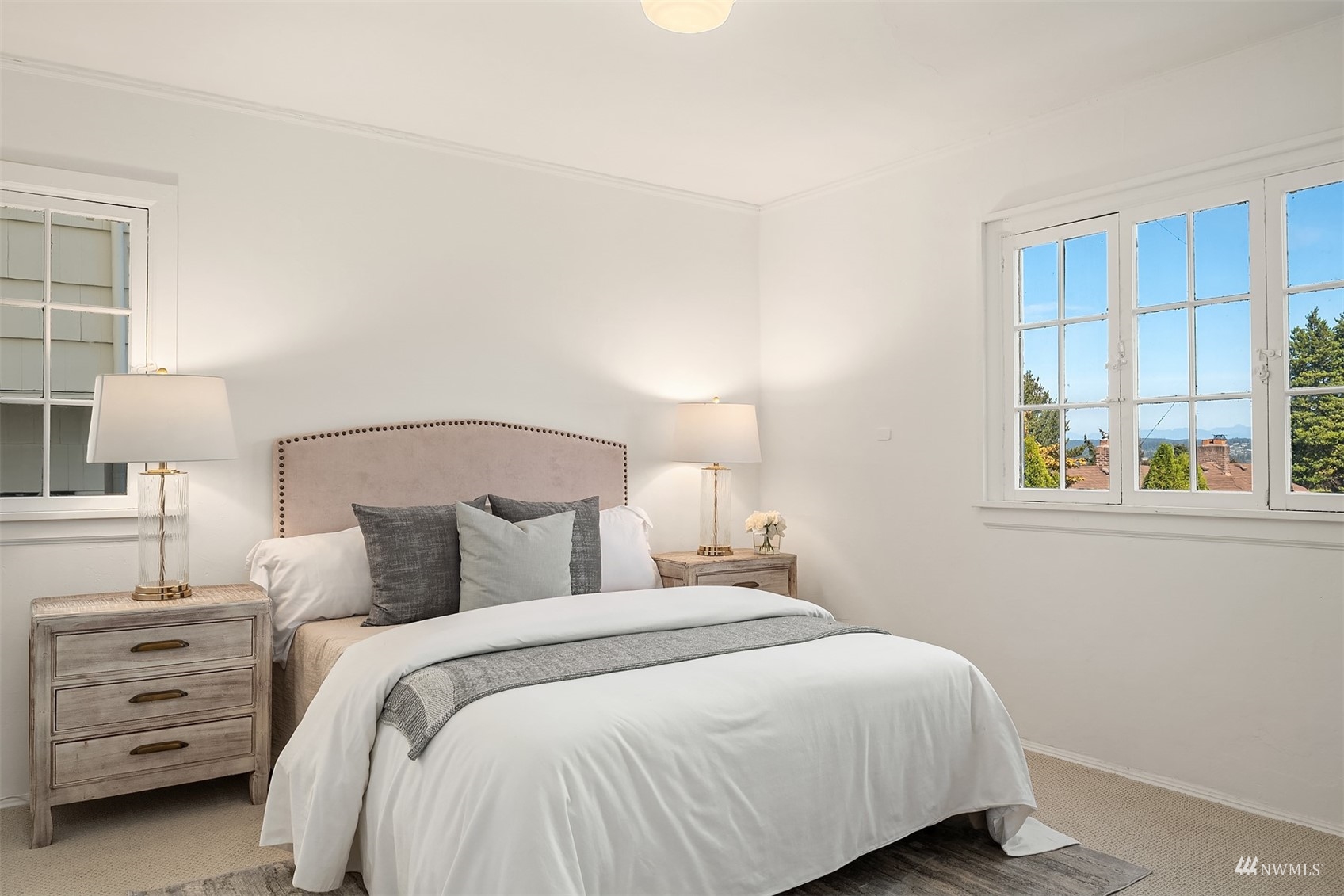732 36th Avenue Seattle, WA 98122 - Photo 29 of 37 a bedroom with a bed and a window