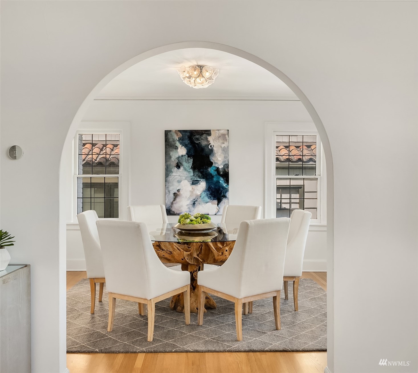 732 36th Avenue Seattle, WA 98122 - Photo 6 of 37 a view of a dining room with furniture and a potted plant