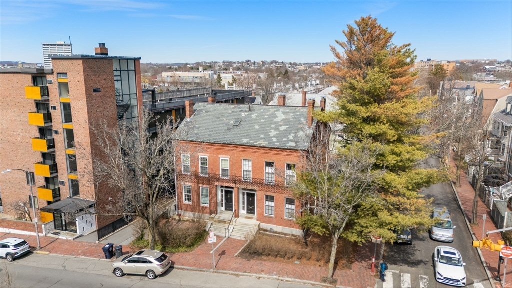 343 Harvard Street Cambridge, MA 02138 - Photo 2 of 41 a view of a city with tall buildings