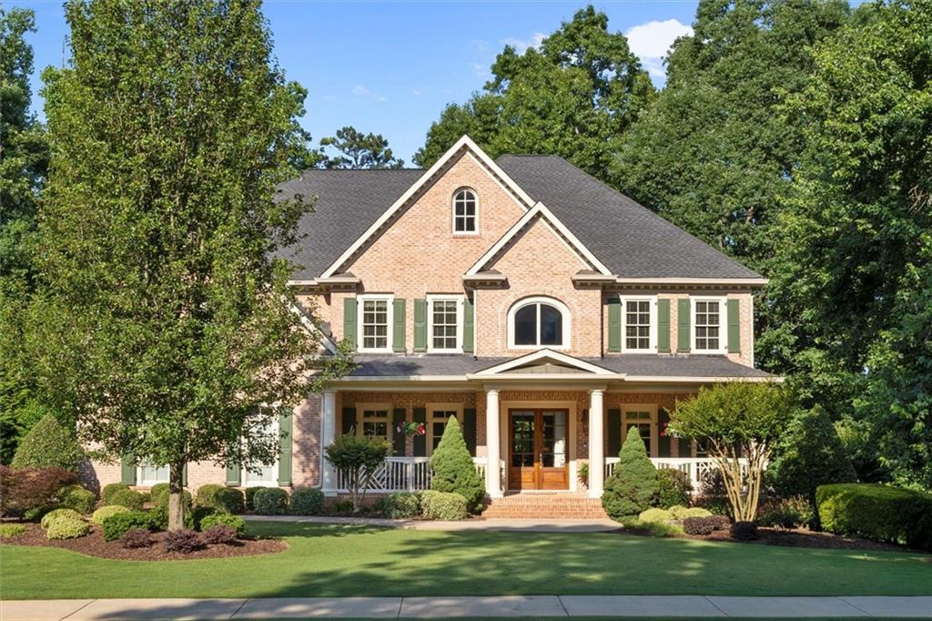 1075 Bream Drive Milton, GA 30004 - Photo 1 of 1 a front view of a house with a yard