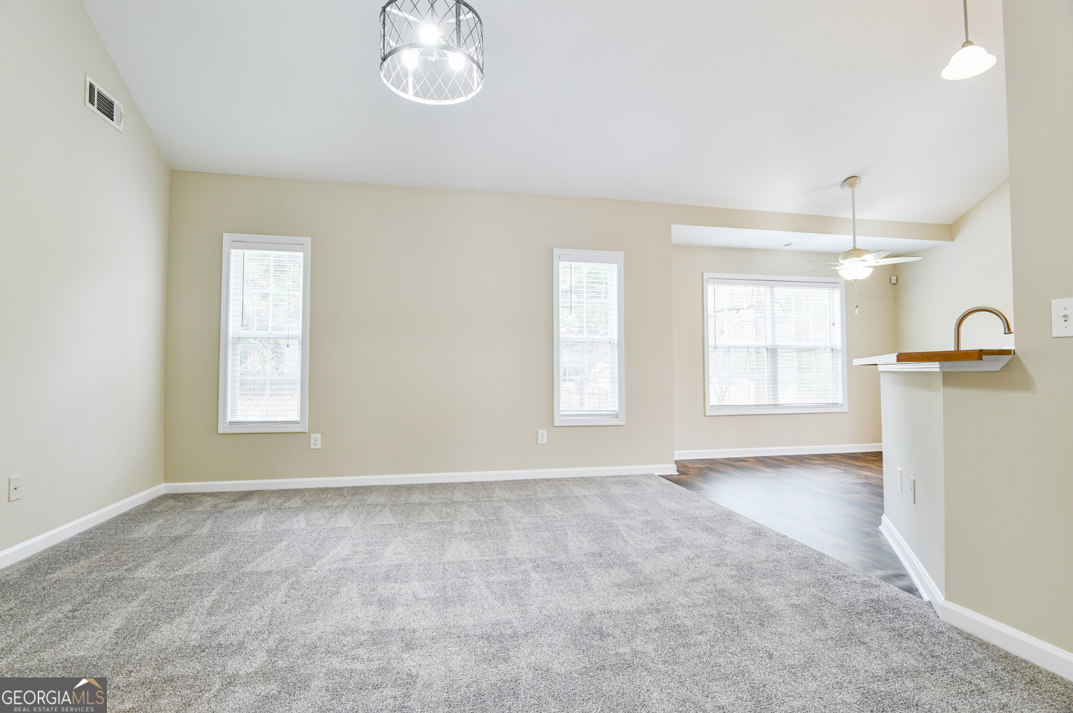 1766 Laurel Ridge Drive Southwest Conyers, GA 30094 - Photo 12 of 61 a view of an empty room with a window