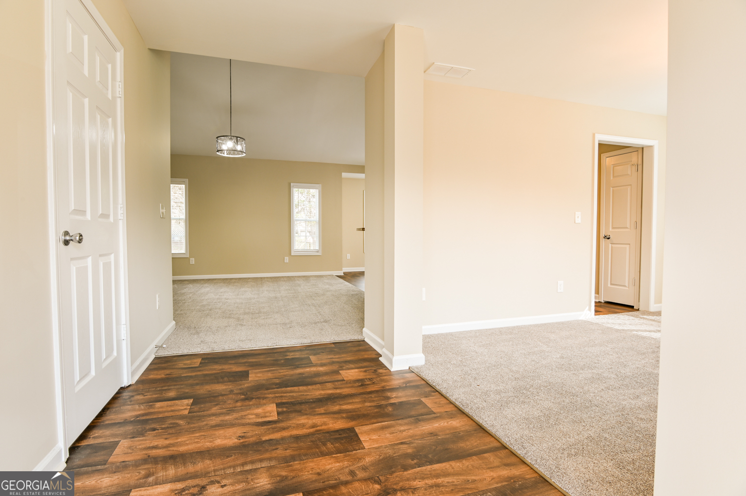 1766 Laurel Ridge Drive Southwest Conyers, GA 30094 - Photo 2 of 61 a view of a hallway with wooden floor