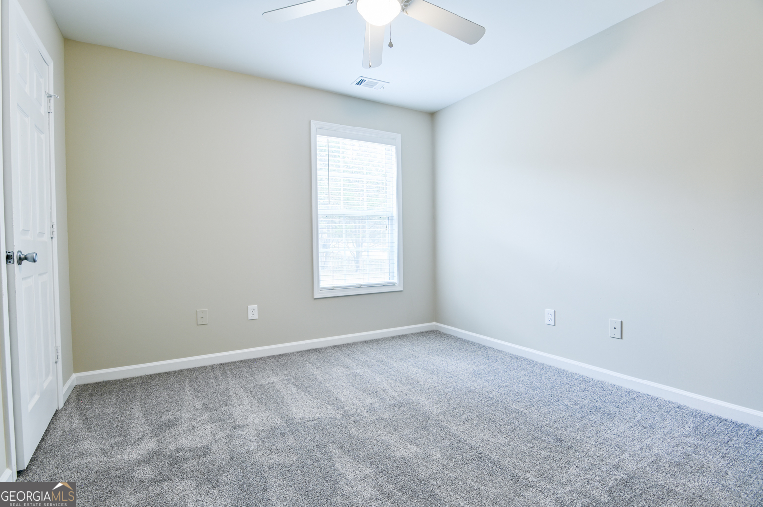 1766 Laurel Ridge Drive Southwest Conyers, GA 30094 - Photo 22 of 61 an empty room with a window