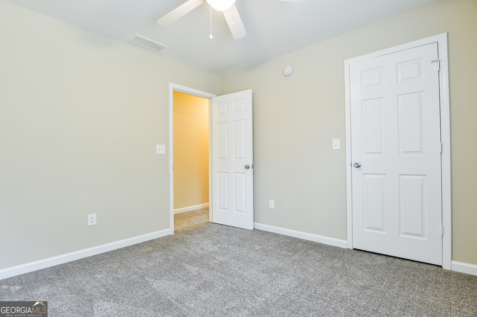 1766 Laurel Ridge Drive Southwest Conyers, GA 30094 - Photo 23 of 61 an empty room with a natural light