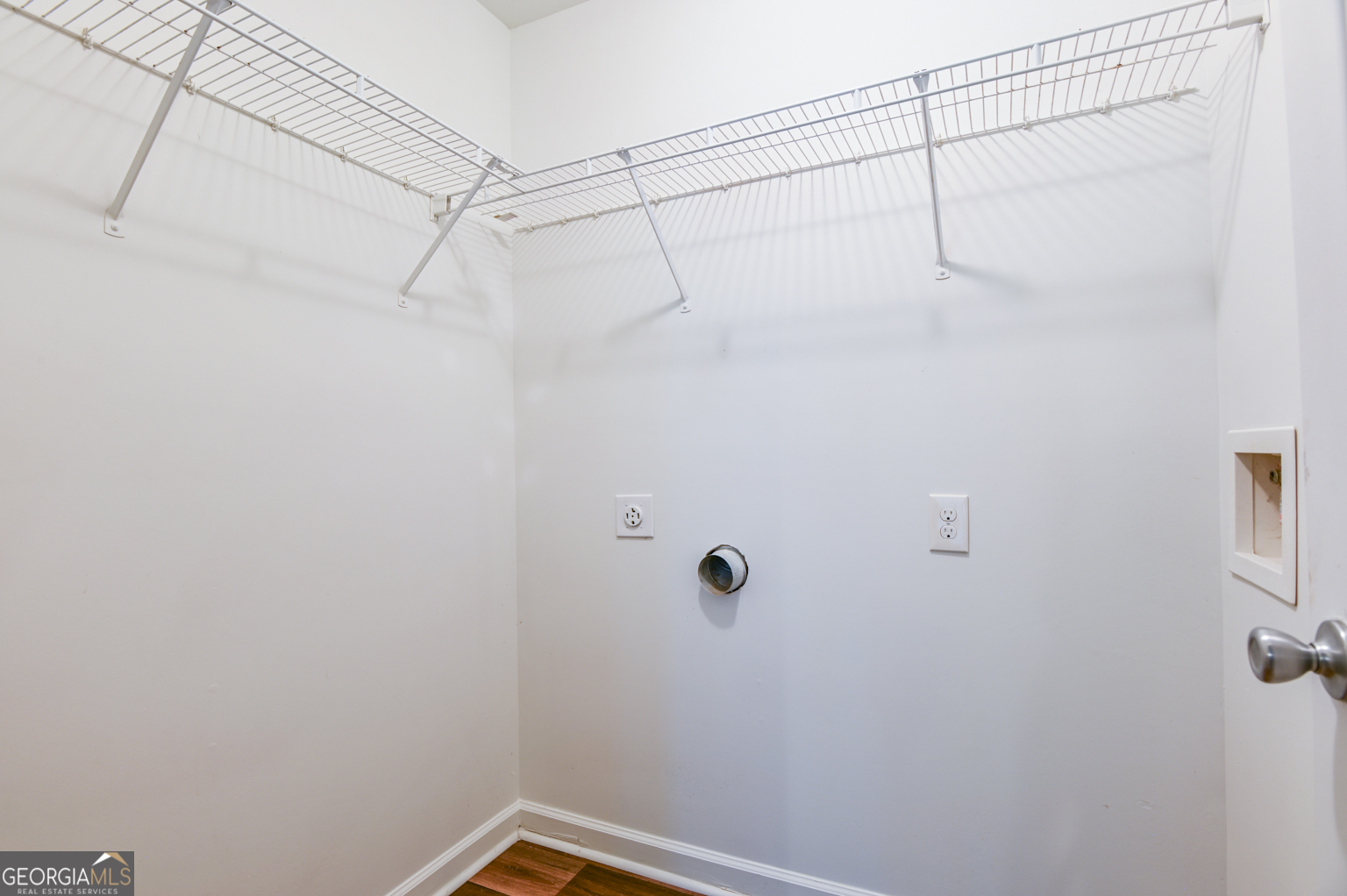 1766 Laurel Ridge Drive Southwest Conyers, GA 30094 - Photo 33 of 61 a view of a room with racks on the wall
