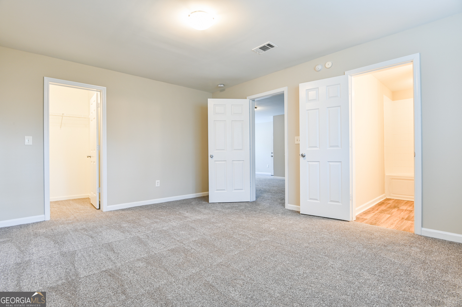 1766 Laurel Ridge Drive Southwest Conyers, GA 30094 - Photo 35 of 61 an empty room with closet area