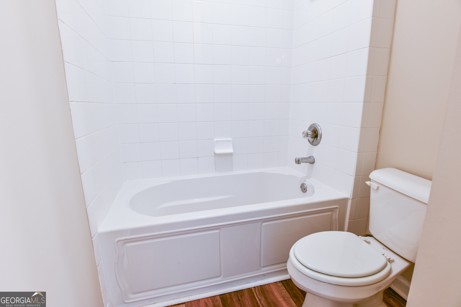 1766 Laurel Ridge Drive Southwest Conyers, GA 30094 - Photo 38 of 61 a bathroom with a toilet and a bathtub