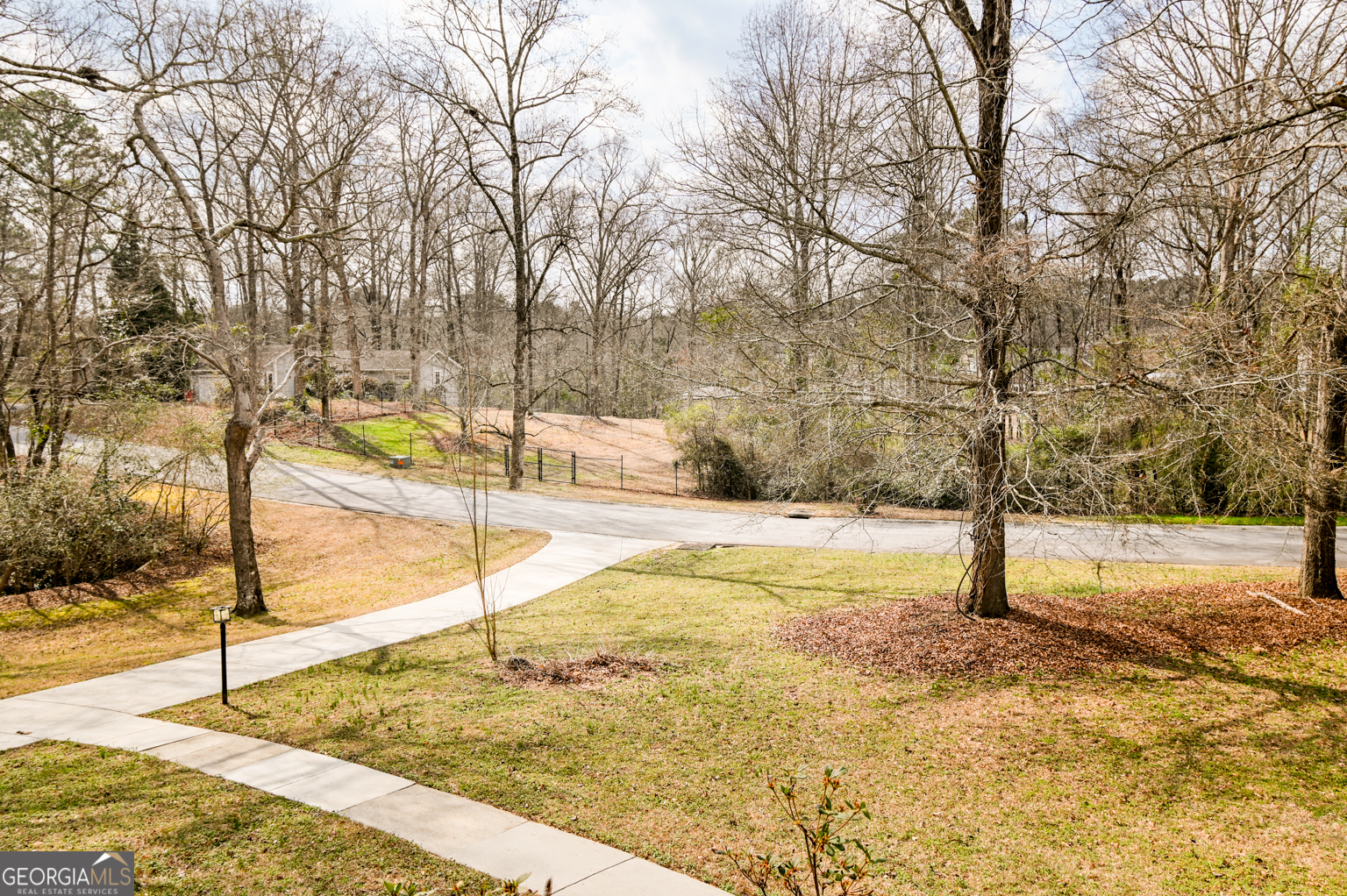 1766 Laurel Ridge Drive Southwest Conyers, GA 30094 - Photo 42 of 61 a view of a yard with trees
