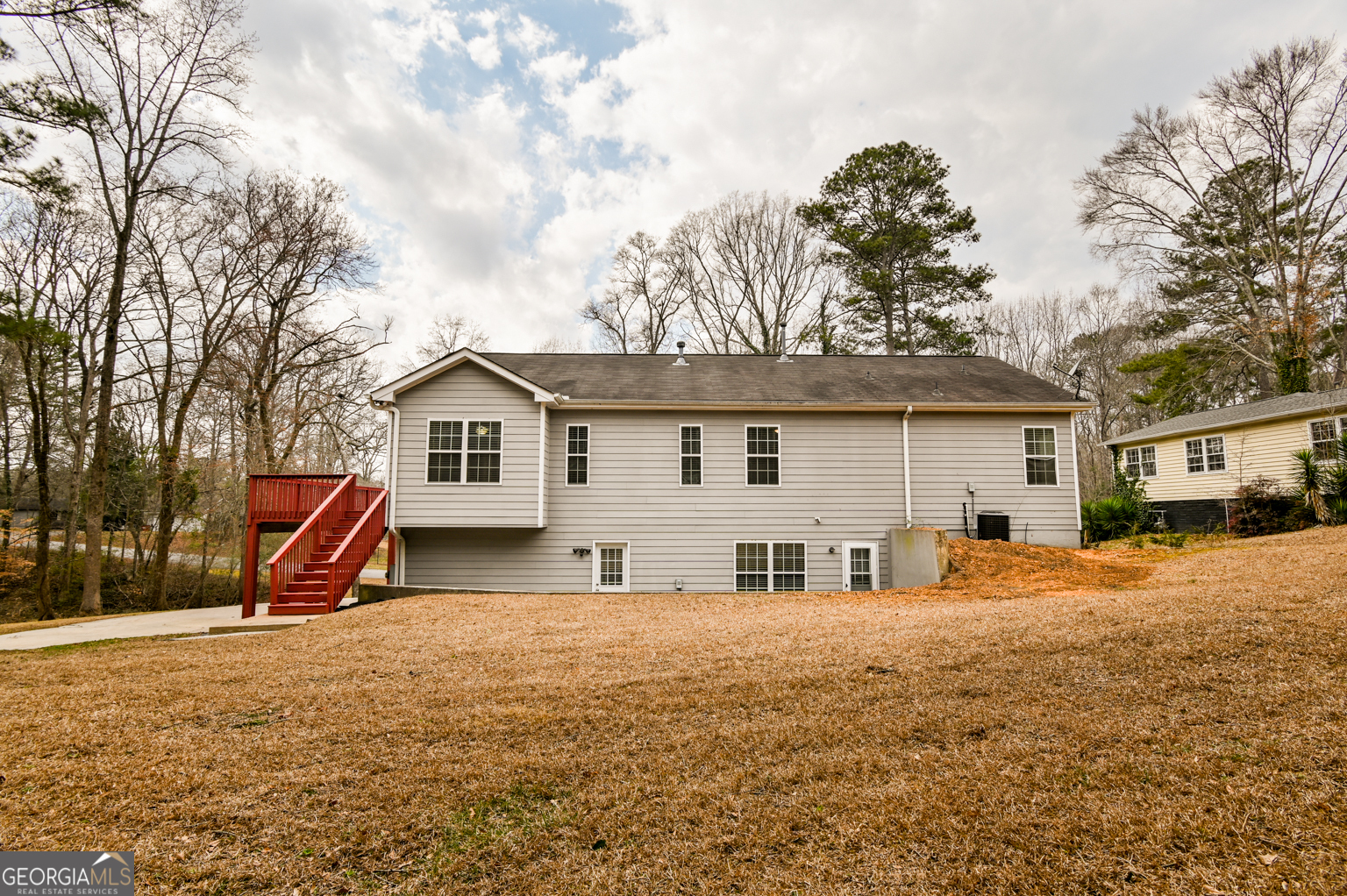 1766 Laurel Ridge Drive Southwest Conyers, GA 30094 - Photo 50 of 61 a view of a house with snow on the road