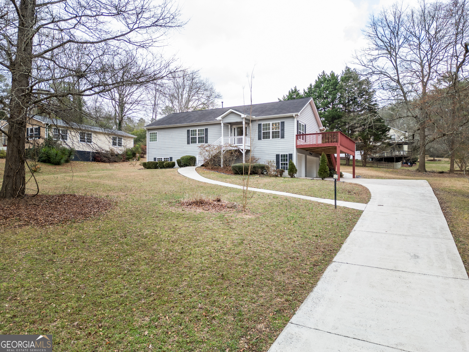 1766 Laurel Ridge Drive Southwest Conyers, GA 30094 - Photo 54 of 61 a front view of a house with a yard