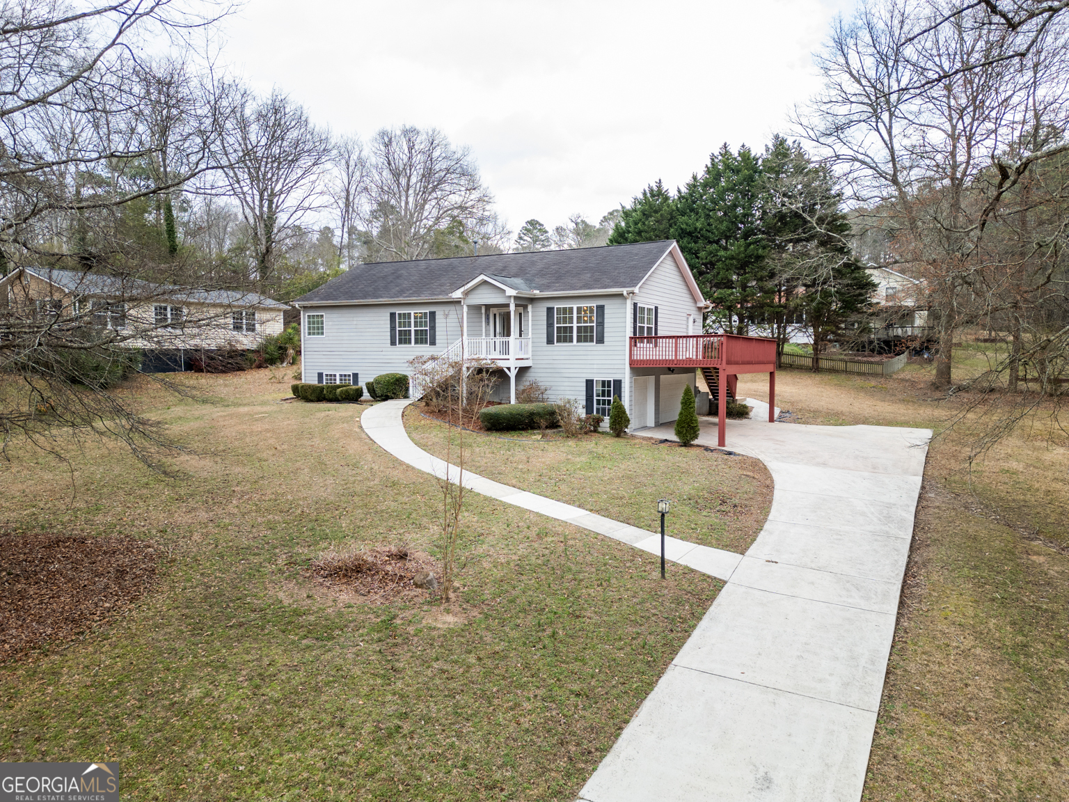 1766 Laurel Ridge Drive Southwest Conyers, GA 30094 - Photo 55 of 61 a view of a house with a patio