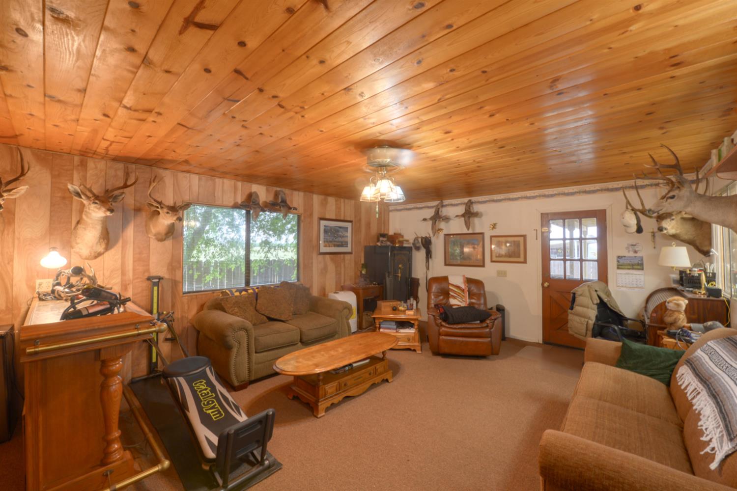 1471 Highway 33 Gustine, CA 95322 - Photo 43 of 57 a living room with furniture a couch and large window