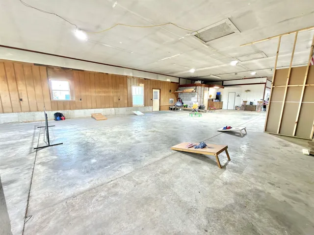 a view of a livingroom with furniture and a rug