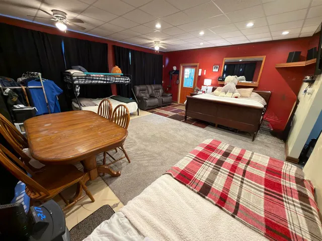 a outdoor space with furniture and a flat screen tv