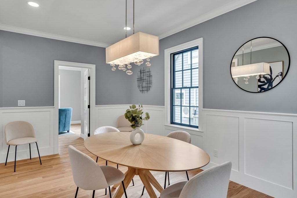 6 Park Street Lexington, MA 02421 - Photo 11 of 42 a view of a dining room with furniture window and wooden floor