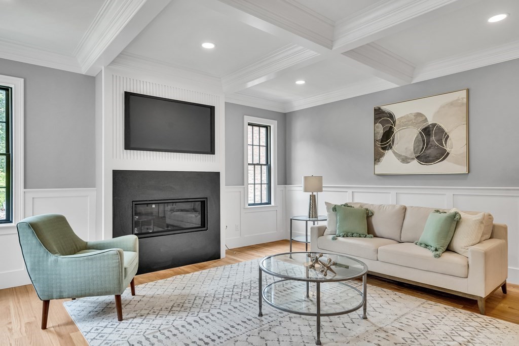 6 Park Street Lexington, MA 02421 - Photo 17 of 42 a living room with furniture and a fireplace