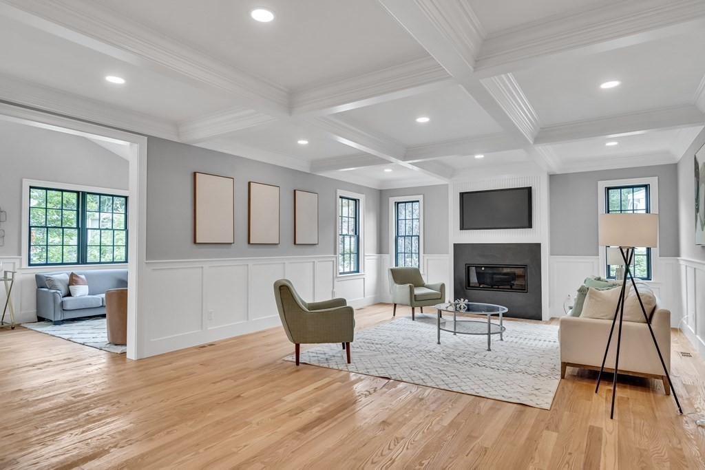 6 Park Street Lexington, MA 02421 - Photo 18 of 42 a living room with furniture and a fireplace
