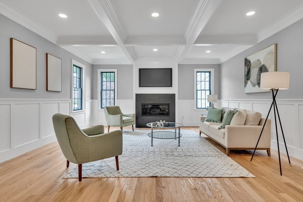 6 Park Street Lexington, MA 02421 - Photo 19 of 42 a living room with furniture and a wooden floor