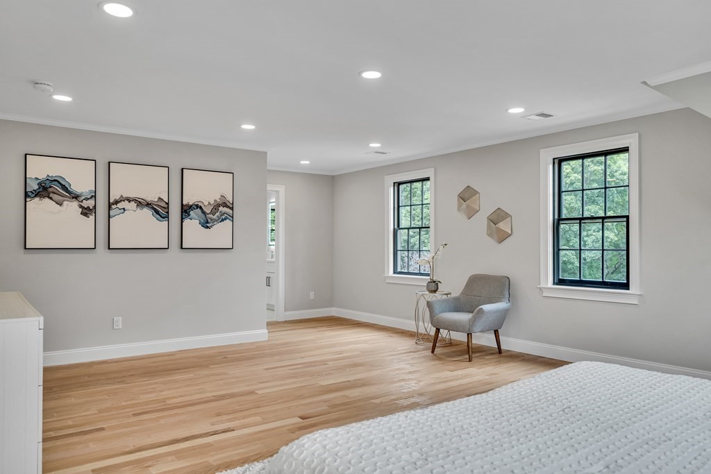 6 Park Street Lexington, MA 02421 - Photo 27 of 42 a view of a livingroom with workspace and a window