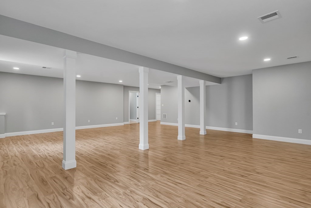 6 Park Street Lexington, MA 02421 - Photo 38 of 42 a view of empty room with wooden floor