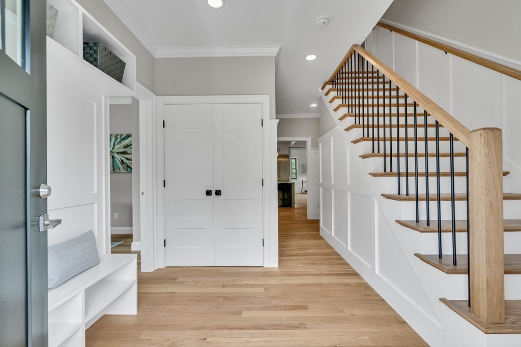 6 Park Street Lexington, MA 02421 - Photo 4 of 42 a view of a hallway with wooden floor and entryway