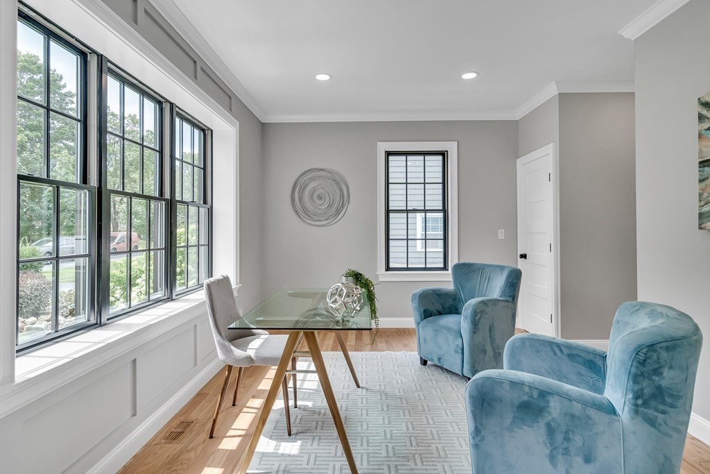 6 Park Street Lexington, MA 02421 - Photo 7 of 42 a living room with furniture and a large window
