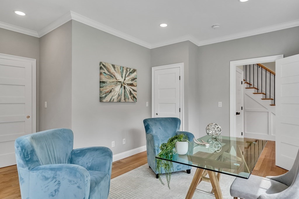 6 Park Street Lexington, MA 02421 - Photo 8 of 42 a living room with furniture and a wooden floor
