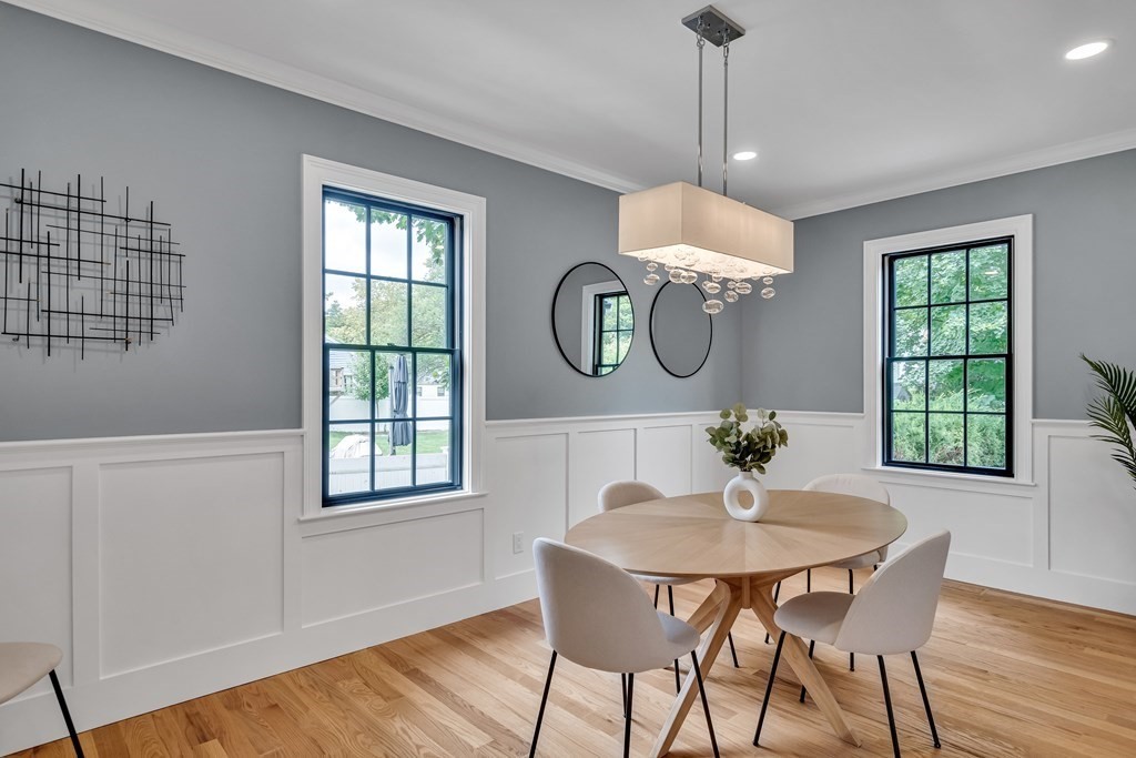 6 Park Street Lexington, MA 02421 - Photo 10 of 42 a view of a dining room with furniture window and wooden floor