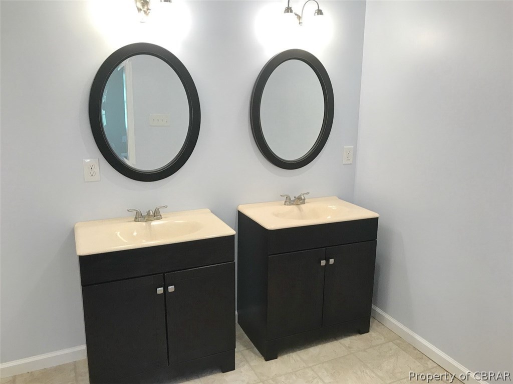 2181 Greys Point Road Topping, VA 23169 - Photo 18 of 20 Master bath suite with double vanities