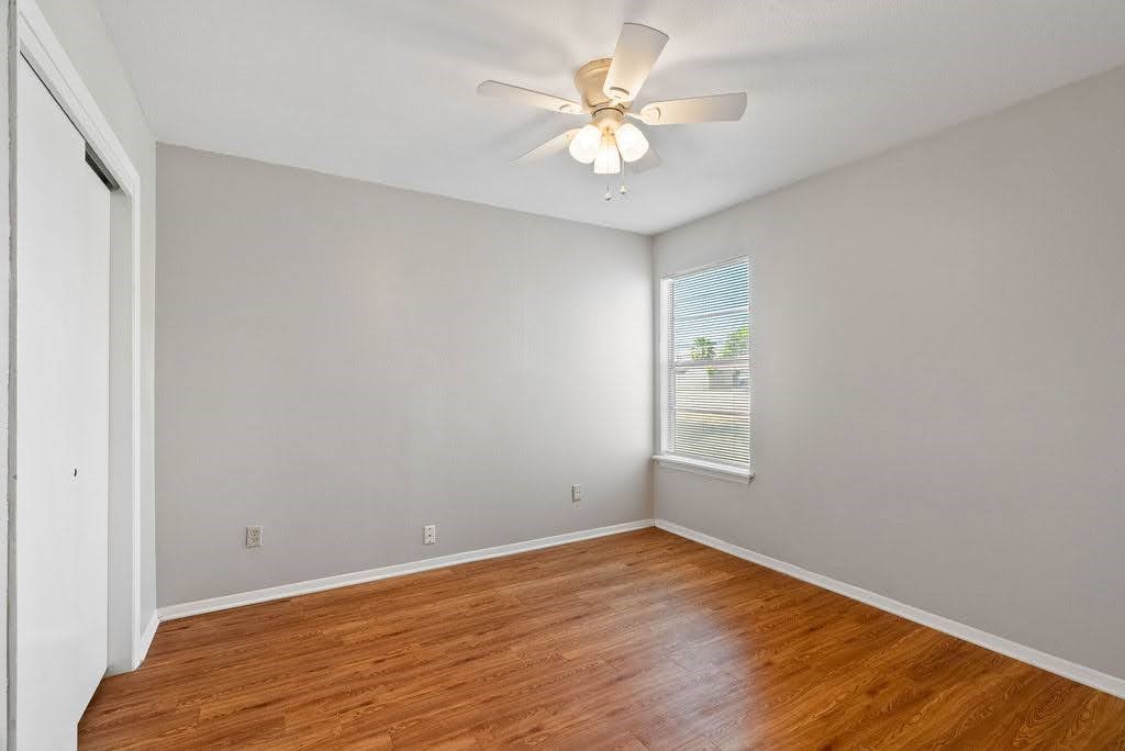1410 Moore Avenue Portland, TX 78374 - Photo 12 of 17 a view of an empty room with a window