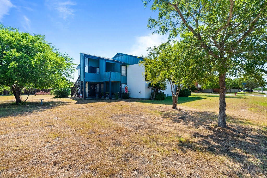 1410 Moore Avenue Portland, TX 78374 - Photo 14 of 17 a house view with a backyard space