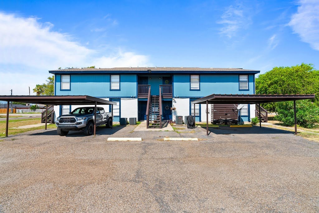 1410 Moore Avenue Portland, TX 78374 - Photo 15 of 17 a view of a car park in front of house