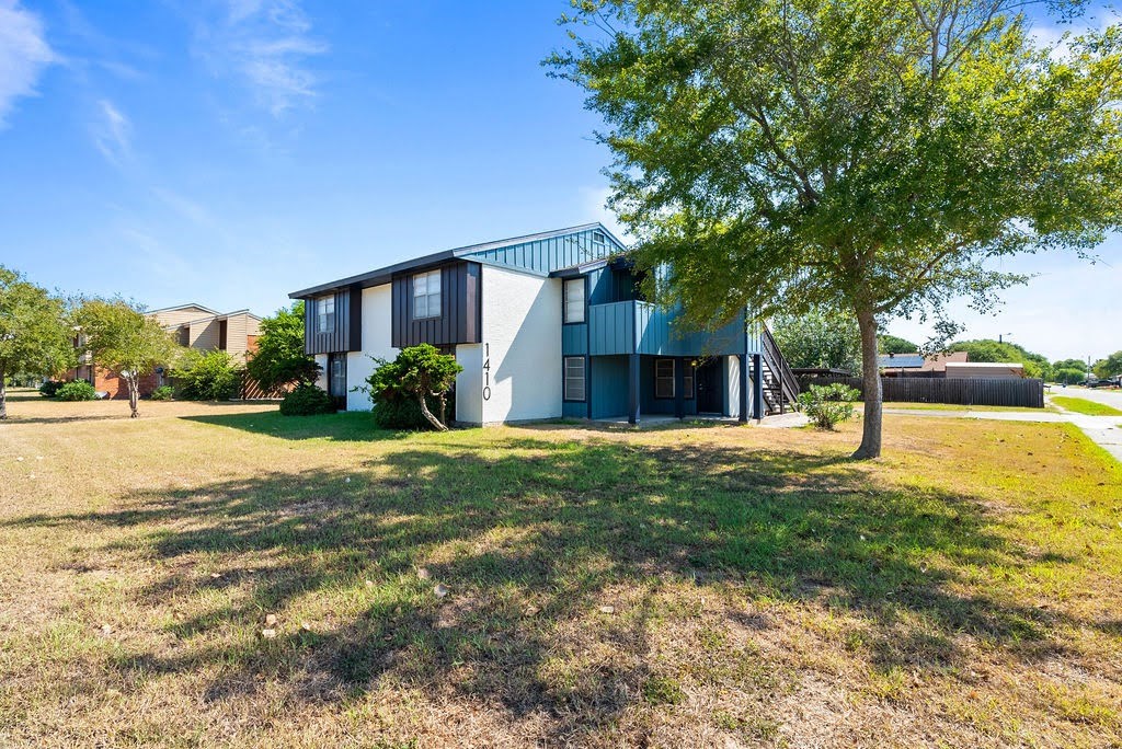 1410 Moore Avenue Portland, TX 78374 - Photo 17 of 17 a view of a house with a yard