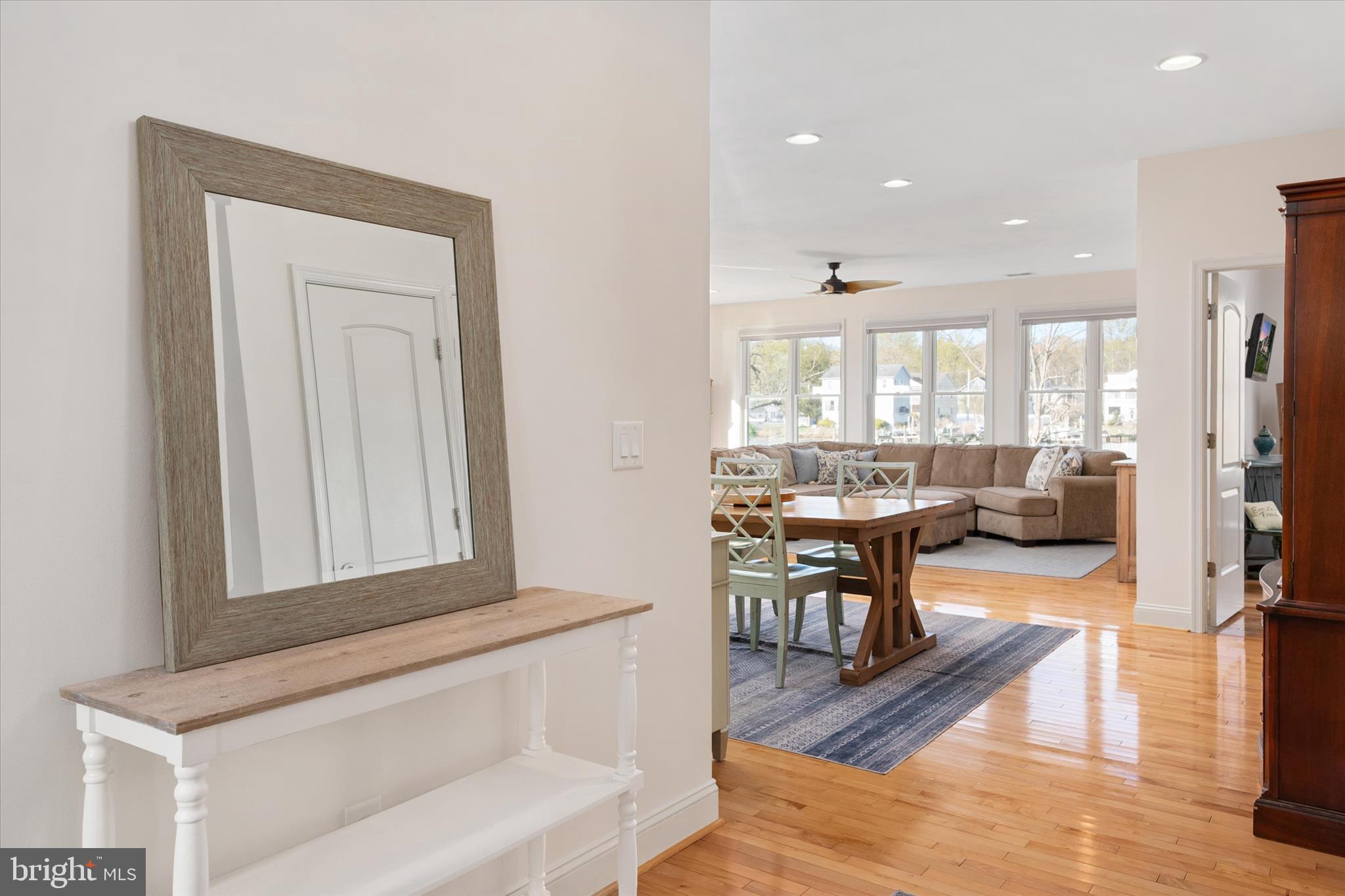 5936 Sneed Drive Deale, MD 20751 - Photo 12 of 59 a view of a dining room with furniture window and wooden floor
