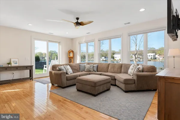 a kitchen with stainless steel appliances a refrigerator stove microwave and cabinets