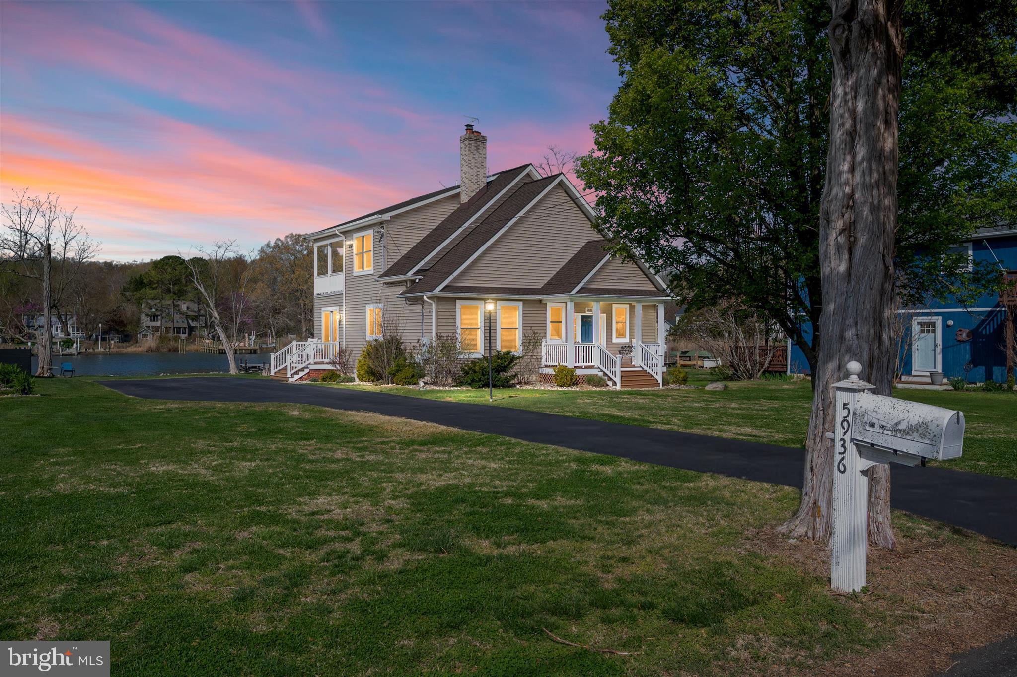 5936 Sneed Drive Deale, MD 20751 - Photo 2 of 59 a front view of a house with garden